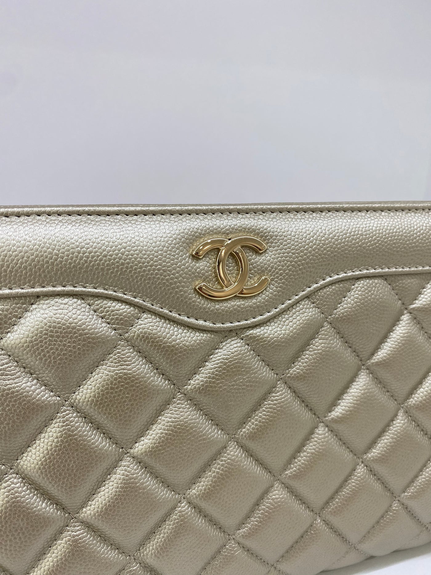 Chanel Gold Caviar Clutch